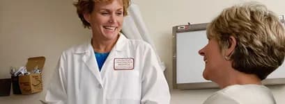 Clinician talking with a patient